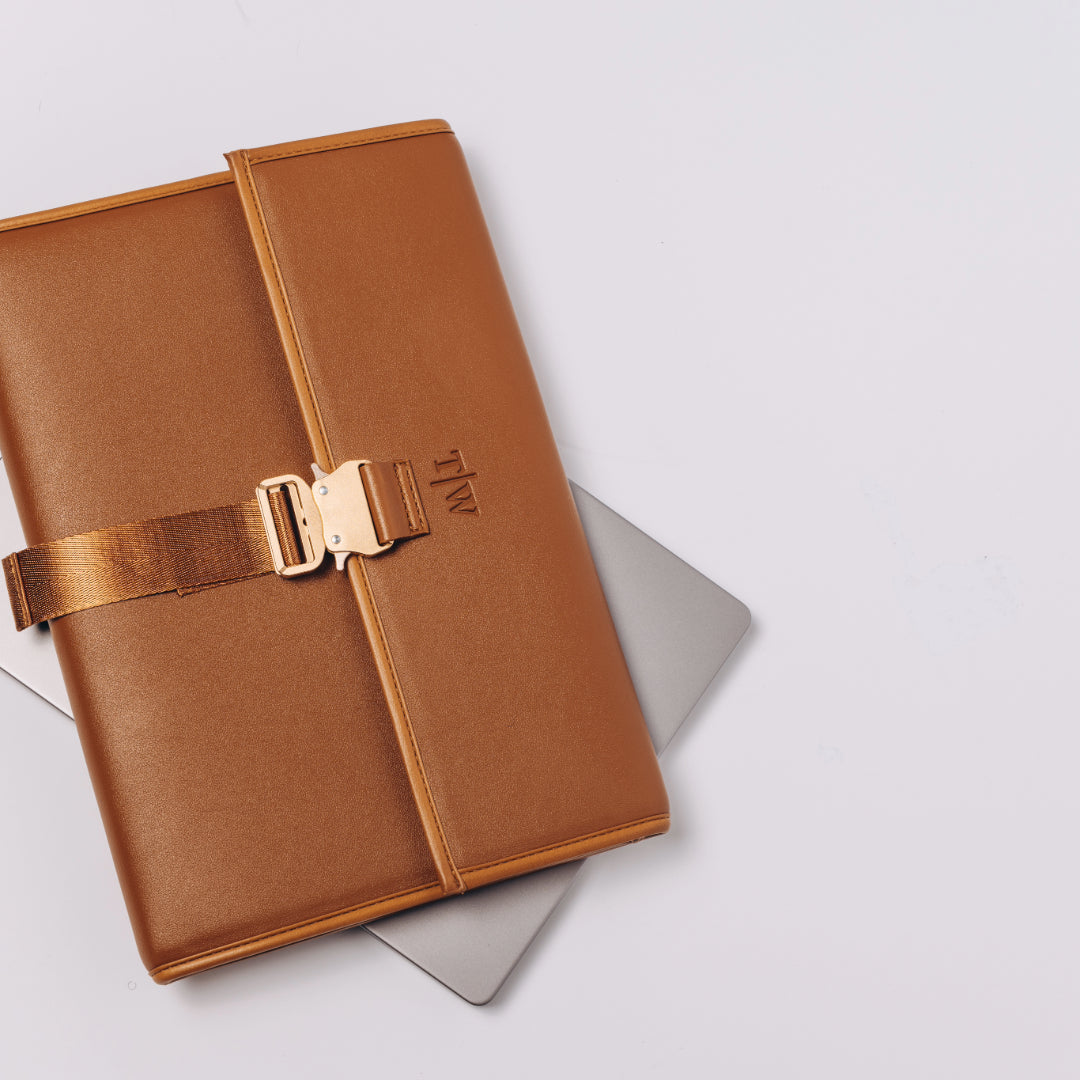 T|W ginger brown laptop bag.
