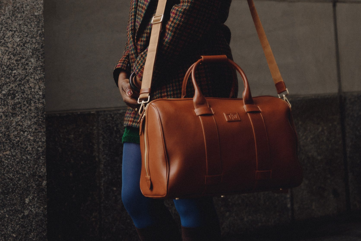 Woman with weekender duffle